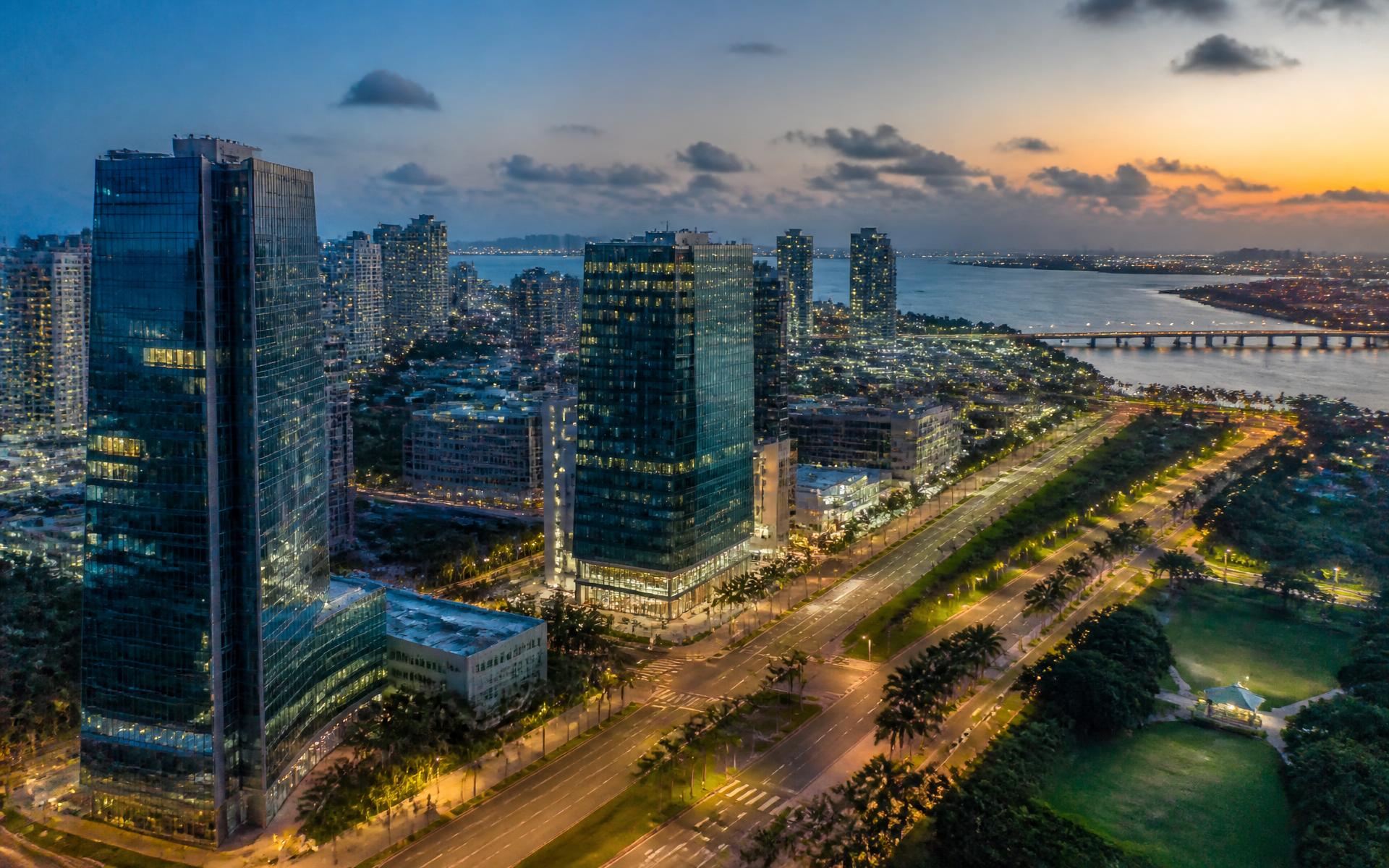 Aerial view of a modern African coastal city at dusk